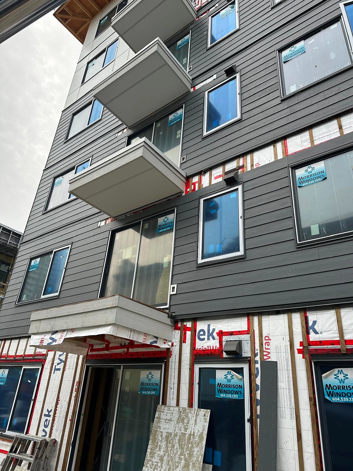 Fibre cement lap over rainscreen