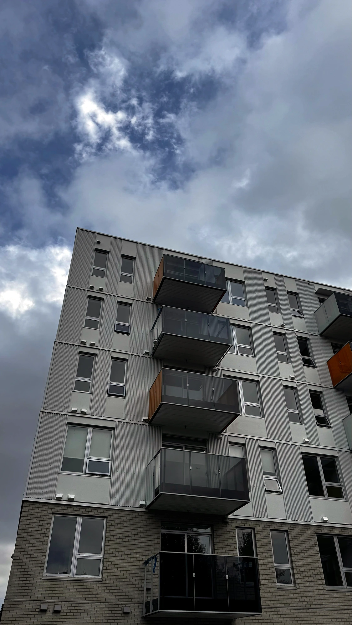 Exterior cladding work on a Lower Mainland mid-rise